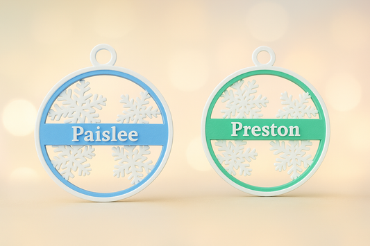 Personalized Christmas ornament with snowflakes and custom name, red and white design