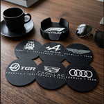Formula 1 team logo coasters set with holder displayed on desk with coffee cup and car key lifestyle setup
