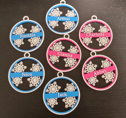 Custom name snowflake ornament in blue and green holiday colors