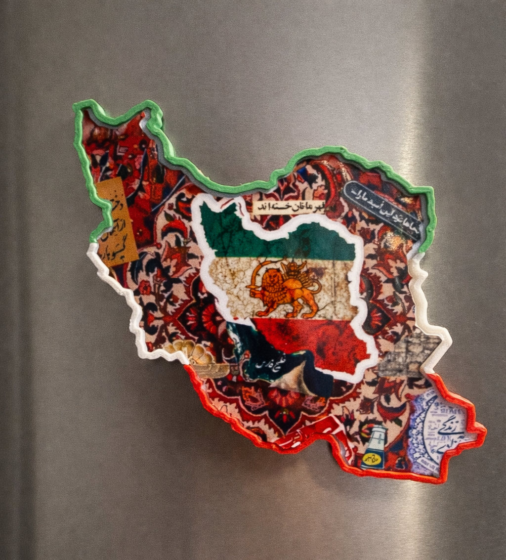 Fridge magnet shaped like a map of Iran with a colorful design on a metallic surface