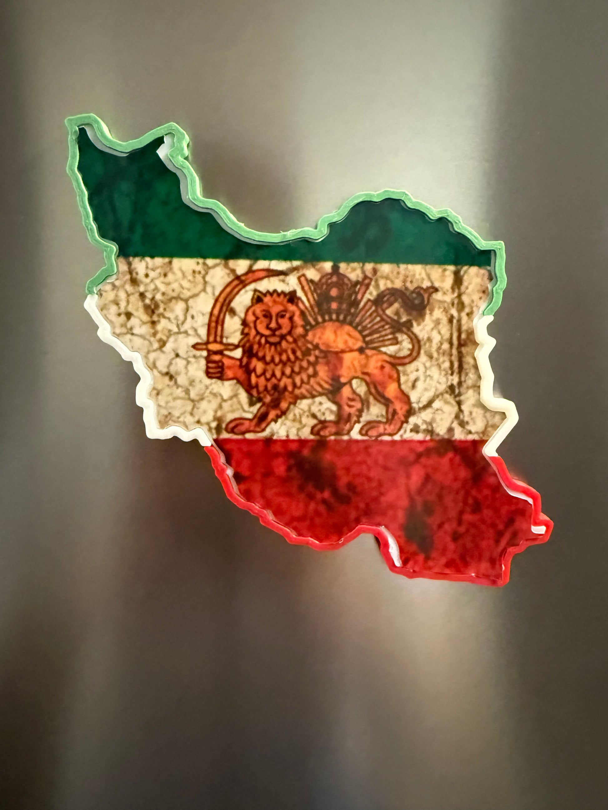 Iran map fridge magnet featuring Lion and Sun design on stainless steel refrigerator surface