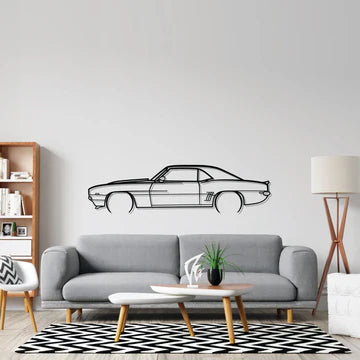 Car wall decal on a white wall above a gray sofa in a living room.
