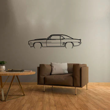 Modern living room with a brown sofa, wooden table, and car-shaped wall art.