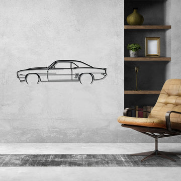Car silhouette wall decal in a modern living room with a chair and shelves.
