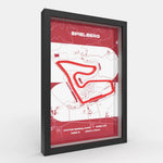A framed minimalist circuit map print of Spielberg race track, featuring a red track line and red header with the word 'SPIELBERG' on a white background, enclosed in a black frame.
Side profile Red Bull Ring track artwork showing elevation layers