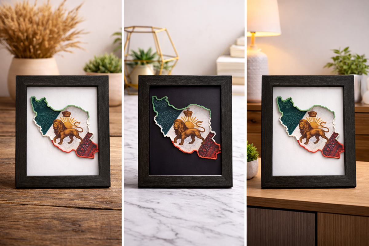 “Iran map 3D wall art in black frame with lion and sun design on a desk”
